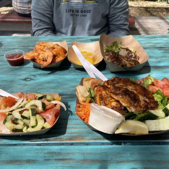 Fish Hut Grill - Front - tomato cucumber salad and large garden salad w blackened grouper Back - 1/2 lb peel and eat shrimp and blackened scallops - American Near Me - Emerald Isle, North Carolina Fish Hut Grill - Front - tomato cucumber salad and large garden salad w blackened grouper Back - 1/2 lb peel and eat shrimp and blackened scallops - American Near Me - Emerald Isle, North Carolina
