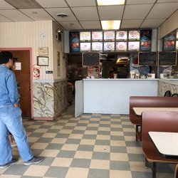 First Wok - Very Informal atmosphere Counter Service.  Dining area has 5 banquette seating.