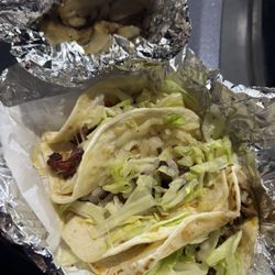 Taqueria Brisa - Tacos..3 different kinds. I had a variety with a fajita, chicken and pastor.