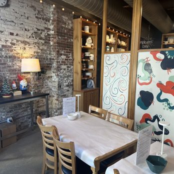 Color Me Mine - Seating behind a partition - Paint-Your-Own Pottery Near Me - Portland, Maine Color Me Mine - Seating behind a partition - Paint-Your-Own Pottery Near Me - Portland, Maine