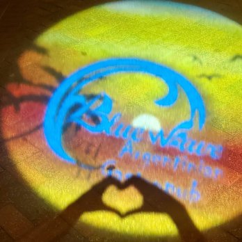 Blue Wave - a person making a heart with their hands - Argentine Near Me - Hollywood, Florida