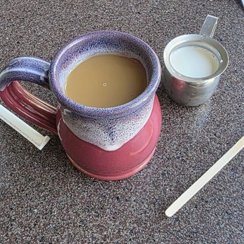 Another Broken Egg Cafe - Coffee cup with little creamer - Breakfast & Brunch Near Me - Burbank, California Another Broken Egg Cafe - Coffee cup with little creamer - Breakfast & Brunch Near Me - Burbank, California