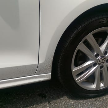 Ultra Car Wash - a close up of the mess tire shine creates. - Car Wash Near Me - Lawrenceville, Georgia