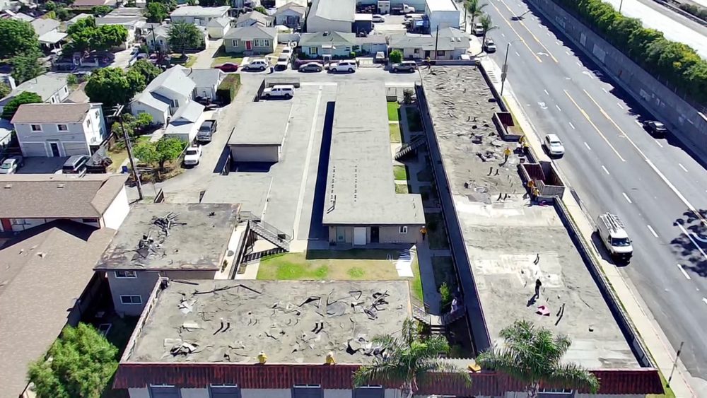 Slide of Queen Roofing