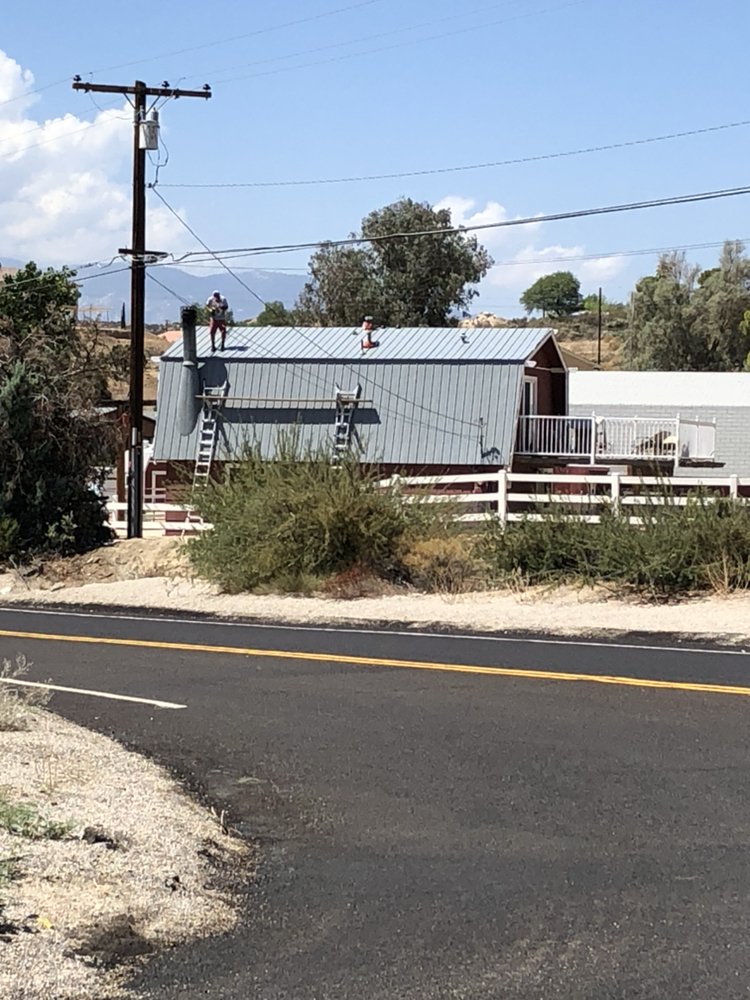 Slide of AMG Roofing