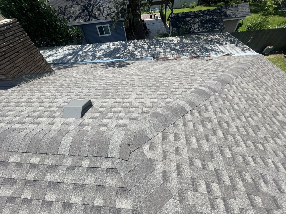 Slide of Dutchmark Roofing