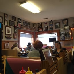 Detroit Sports memorabilia all over the walls.