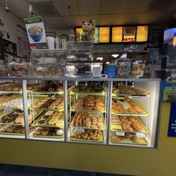 Master Fresh Donuts - John counter with menu in the background