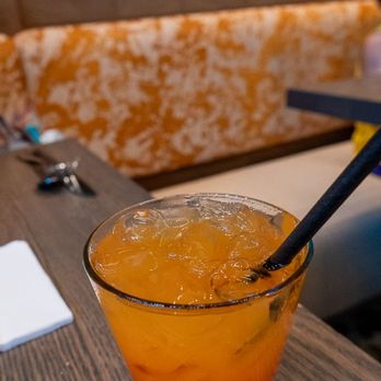 Kona Cafe - Polynesian Red Eye with Malibu Coconut Rum, Liliko'i Juice, and Grenadine - Sushi Bars Near Me - Lake Buena Vista, Florida