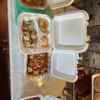 Himalayan Kitchen - a variety of food items on a counter - Himalayan/Nepalese Near Me - Smyrna, Georgia Himalayan Kitchen - a variety of food items on a counter - Himalayan/Nepalese Near Me - Smyrna, Georgia