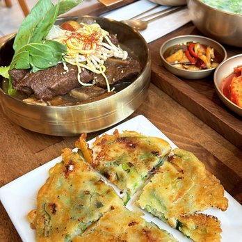 Gomtangjip - a variety of food on a table - Korean Near Me - Palisades Park, New Jersey Gomtangjip - a variety of food on a table - Korean Near Me - Palisades Park, New Jersey