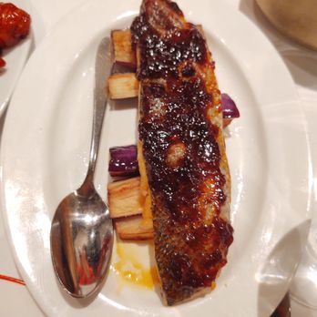 Philippe Chow - Work seared branzino with eggplant - Chinese Near Me - New York, New York Philippe Chow - Work seared branzino with eggplant - Chinese Near Me - New York, New York