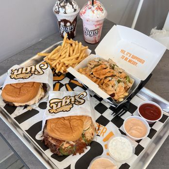 Sign Smash Burger - Double patty burger meal with fries, signature burger, loaded fries, cookies and cream shake, strawberry shake - Burgers Near Me - Orange, California Sign Smash Burger - Double patty burger meal with fries, signature burger, loaded fries, cookies and cream shake, strawberry shake - Burgers Near Me - Orange, California