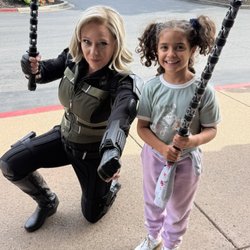 My daughter and a cosplayer at an event that happened at Flying Colors