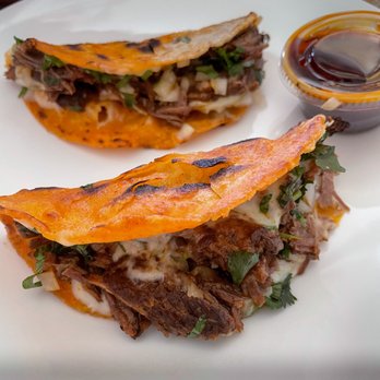 Green Apple Produce - two tacos on a white plate - Butcher Near Me - Hobe Sound, Florida