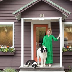 Nest Jackson Hole - Store Owner, Noa, and her dogs outside the shop.