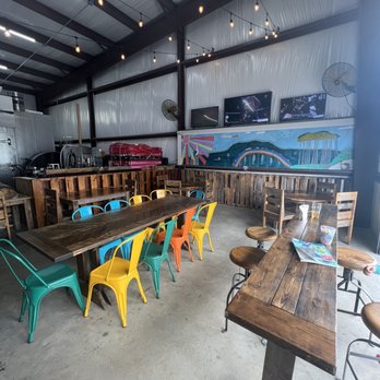 Odd Pelican Beer Company - tables and chairs - Brewpubs Near Me - Freeport, Florida