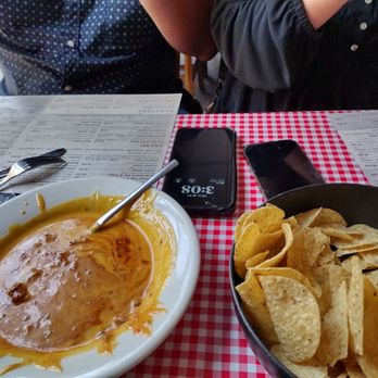 Buffalo Grill - Chili cheese dip and chips - Burgers Near Me - Little Rock, Arkansas Buffalo Grill - Chili cheese dip and chips - Burgers Near Me - Little Rock, Arkansas