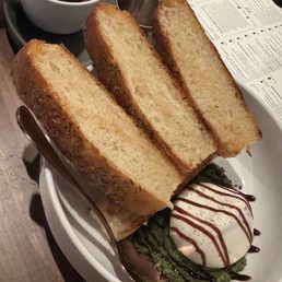 Burrata on pesto puree with focaccia was incredible! Marinated olives delicious as well. Burrata on pesto puree with focaccia was incredible! Marinated olives delicious as well.