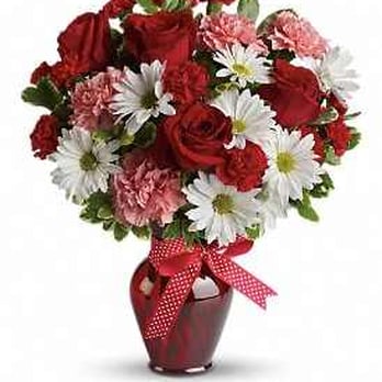 Flowers By Snellings - The one with the bow is what I ordered and the other is what she received. - Florists Near Me - Winchester, Virginia