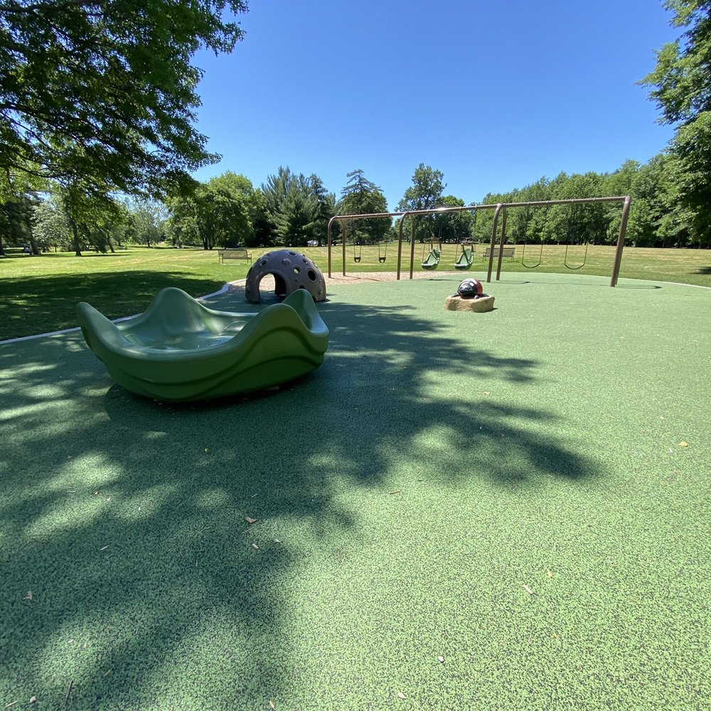 Swings, nature statues, spinning disk