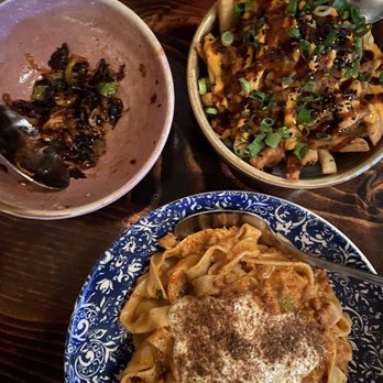 Bar Peached - Mapo bolognese, Charred Brussels, Spicy Gochu Pork Fries - Cocktail Bars Near Me - Austin, Texas Bar Peached - Mapo bolognese, Charred Brussels, Spicy Gochu Pork Fries - Cocktail Bars Near Me - Austin, Texas