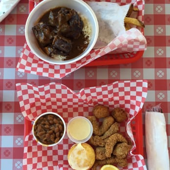 Southern Grill - Oxtail and Catfish w/ baked beans, fries, and corn bread - Southern Near Me - Tukwila, Washington Southern Grill - Oxtail and Catfish w/ baked beans, fries, and corn bread - Southern Near Me - Tukwila, Washington