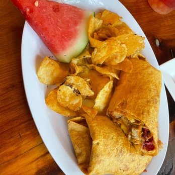 Bassano Cheesecake Cafe - Chipotle Chicken Wrap - served with chips and fresh fruit - Desserts Near Me - Safety Harbor, Florida Bassano Cheesecake Cafe - Chipotle Chicken Wrap - served with chips and fresh fruit - Desserts Near Me - Safety Harbor, Florida