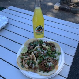 5 tacos with a pineapple drink 5 tacos with a pineapple drink