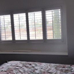 White shutters in master bedroom