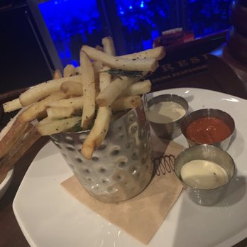 The Wine and Spirits Kitchen - Fries with trio sauces of red pepper ketchup, garlic aioli and cheese. So GOOD - New American Near Me - Delray Beach, Florida The Wine and Spirits Kitchen - Fries with trio sauces of red pepper ketchup, garlic aioli and cheese. So GOOD - New American Near Me - Delray Beach, Florida