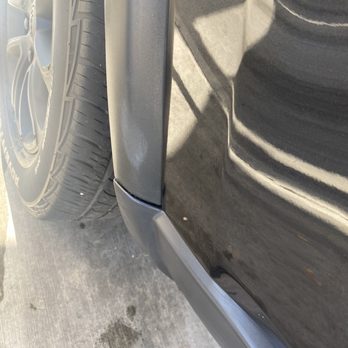 Kenyon Auto Cosmetics - Overspray still in the car and the white spot on the trim that they created with their products - Auto Detailing Near Me - Phoenix, Arizona