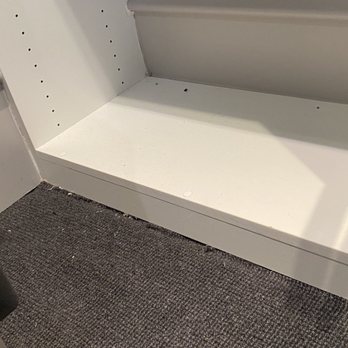 Hall's Flooring - a white shelf with holes in it - Interior Design Near Me - Charlotte, North Carolina Hall's Flooring - a white shelf with holes in it - Interior Design Near Me - Charlotte, North Carolina