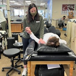Galena Sport Physical Therapy - Jeanine Seewald PTA treats her patients arm.