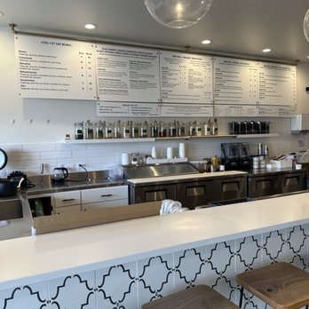 Vibe Well - a restaurant counter with stools and menus - Juice Bars & Smoothies Near Me - Fenton, Michigan Vibe Well - a restaurant counter with stools and menus - Juice Bars & Smoothies Near Me - Fenton, Michigan