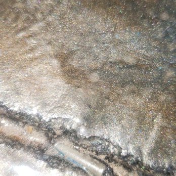 Quality Epoxy - More wire insulation,  this one has some epoxy,  dirt,  and other debris hanging out with it.  Jon Kopp is the Ray Charles of epoxy floors. - Flooring Near Me - Gilbert, Arizona
