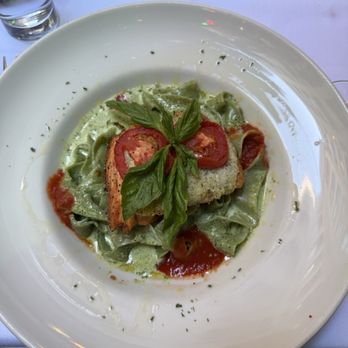 La Fontana Siciliana - Salmon over pasta with lemon cream sauce - Sicilian Near Me - Seattle, Washington
