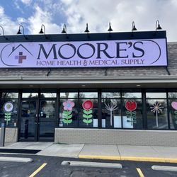 Moore's Home Health & Medical Supply - Store front decorated for Spring