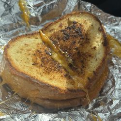 In Cheese We Trust - Garlic bread grilled cheeses