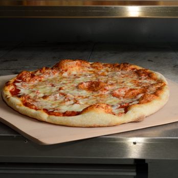 Say Cheese Express Kosher Pizza - a pizza in the oven - Pizza Near Me - Monsey, New York Say Cheese Express Kosher Pizza - a pizza in the oven - Pizza Near Me - Monsey, New York