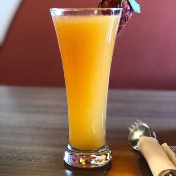 Snooze, an A.M. Eatery - Blood-Orange Mimosa - Breakfast & Brunch Near Me - Nashville, Tennessee