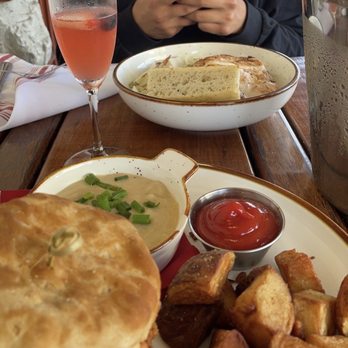 The Root Cellar Cafe - Pesto Pasta Lunch, Porters Biscuit Sandwich, Mimosa - Breakfast & Brunch Near Me - San Marcos, Texas