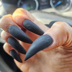 Nails 2000 - Bleeding cuticles-which she poured "thinner" on and bumpy gel over acrylic.mind blown  I paid for this service