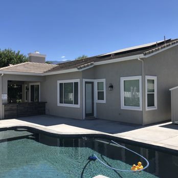 Leos Brothers Painting - a house with a pool - Painters Near Me Leos Brothers Painting - a house with a pool - Painters Near Me