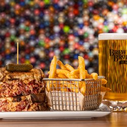 Brew Brothers - Classic Ruben Sandwich with Brew Brothers fries and a mug of beer, available at Brew Brothers in Harrah's Columbus, NE.