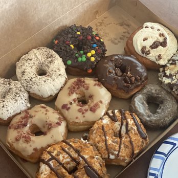 Wake N Bake Donuts - Espresso, wake and bacon, butterfinger smash, slim shady, blueberry-not sure which is which. - Donuts Near Me - Carolina Beach, North Carolina Wake N Bake Donuts - Espresso, wake and bacon, butterfinger smash, slim shady, blueberry-not sure which is which. - Donuts Near Me - Carolina Beach, North Carolina