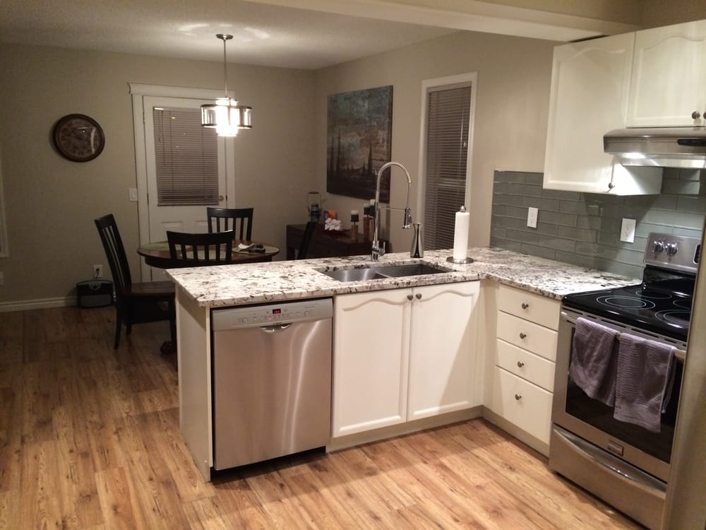 Fully Renovated Kitchen Alaska White Granite Textured Laminate