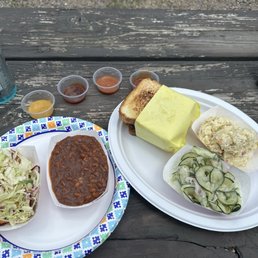 Brisket sandwich, baked beans, cole slaw, potato salad, and smack my ass good cucumber salad. Brisket sandwich, baked beans, cole slaw, potato salad, and smack my ass good cucumber salad.