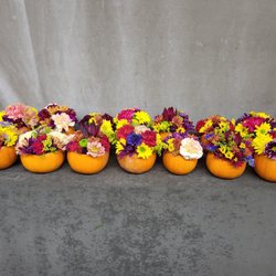 Flowers by Gillian - Every October I buy pumpkins from the LAHS Choir/ROTC pumpkin patch and make ecofriendly arrangements for purchase to make everyone smile!