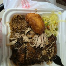 Jerk chicken, cabbage, peas and rice, and corn fritter. YUM! Jerk chicken, cabbage, peas and rice, and corn fritter. YUM!